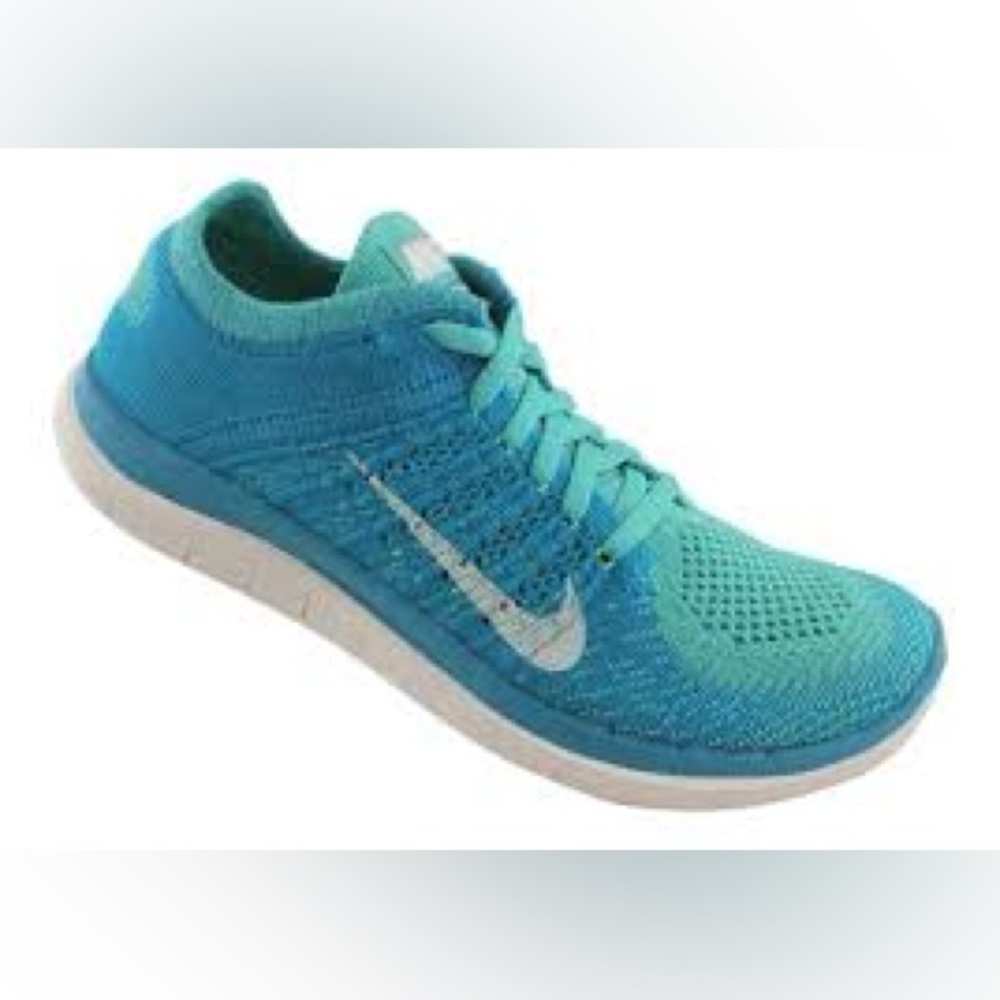 Nike Women's Free 4.0 Flyknit running shoes in a turquoise blue size 7